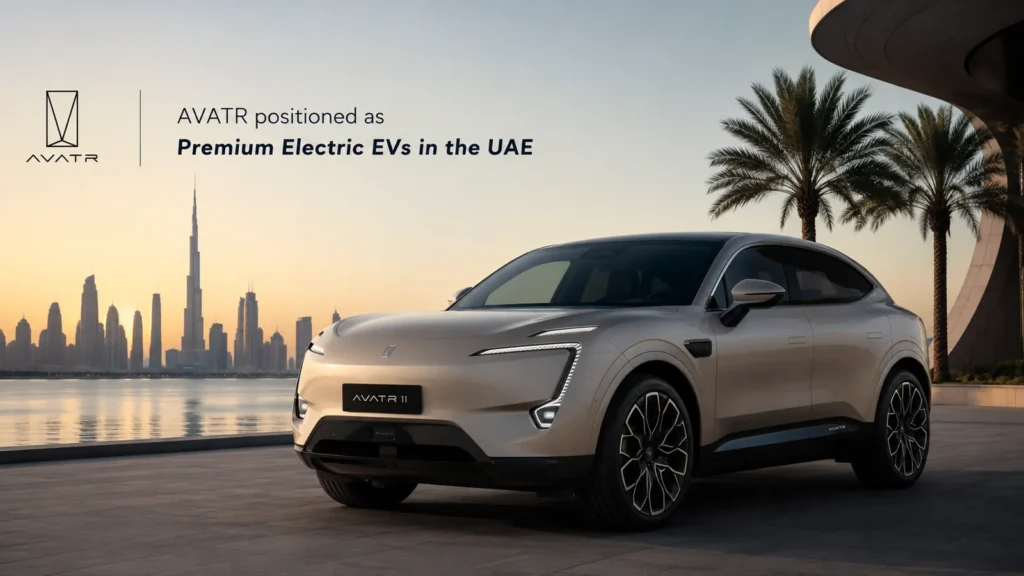 An AVATR electric SUV photographed against the Dubai skyline at sunset.